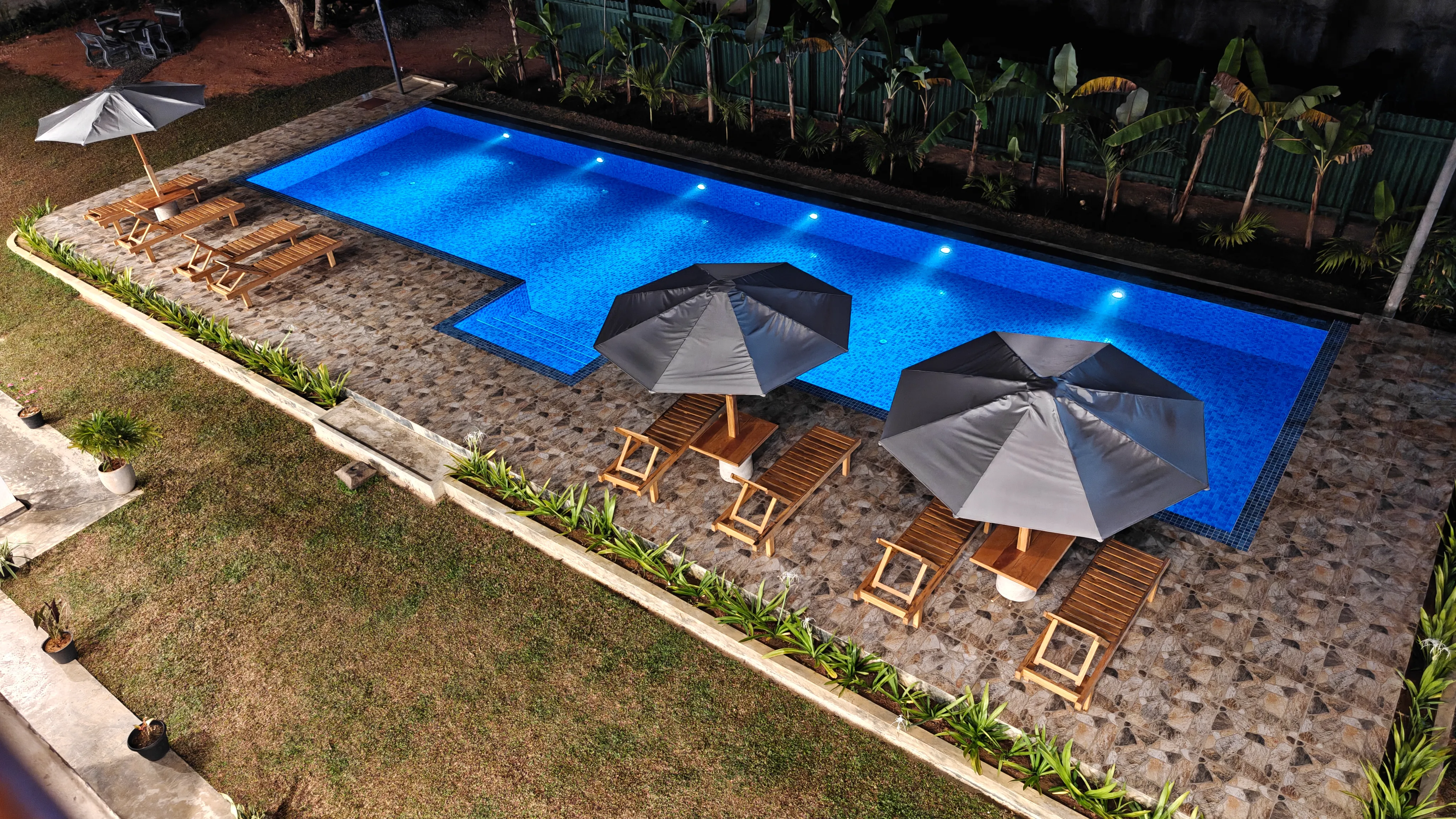 The 60ft swimming pool at Hotel Siyomin illuminated at night